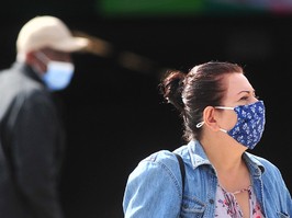 Mask-wearing pedestrians in Vancouver.