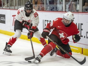 The Ottawa franchise has its first three signings, the Professional Women's Hockey League announced Tuesday. Forwards Emily Clark and Brianne Jenner, and goaltender Emerance Maschmeyer have all agreed to terms on three-year deals that will run through 2026. Clark (26) knocks Switzerland defender Sarah Forster (3) off the puck during first period IIHF Women's World Hockey Championship semifinal hockey action in Brampton, Ont., on Saturday April 15, 2023.