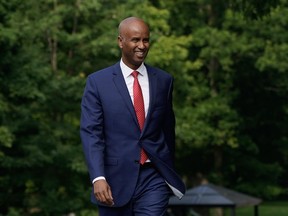 International Development Minister Ahmed Hussen says he's focused on speeding up aid funding while cementing the Trudeau legacy around feminist policy. Hussen smiles as he walks to a cabinet shuffle at Rideau Hall, in Ottawa, Wednesday, July 26, 2023.