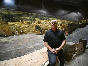Pierre Blouin sits inside the Cyclorama de Jerusalem, in Ste-Anne-de-Beaupré, Que., on Wednesday, Sept. 6, 2023. The last cyclorama in Canada has been hidden from public view since it shuttered in 2018, but a small group of people are hoping to revive the once popular attraction.