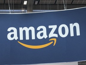 FILE - The Amazon logo is photographed at the Vivatech show in Paris, on June 15, 2023. Amazon is investing up to $4 billion in Anthropic and taking a minority stake in the artificial intelligence startup, the two companies said Monday Sept. 25, 2023.