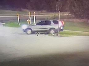 This image provided by Michigan State Police shows a vehicle driven by a person suspected of setting fire and shooting at multiple Michigan State Police patrol vehicles in the sate's Upper Peninsula. The vehicles at the Sault Ste. Marie Post were lit on fire and struck by rifle rounds early Wednesday, Sept. 6, 2023, state police said. No troopers were in the vehicles at the time of the attack. (Michigan State Police via AP)