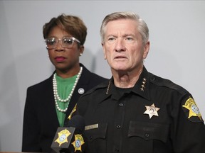 Richland County Sheriff Leon Lott, right, and Councilmember Gretchen Barron speak at a news conference on Monday, Sept. 25, 2023 in Columbia, S.C.