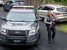 Pennsylvania State Troopers and other law enforcement officers are on the scene in Nantmeal Village as the search for escaped convict Danelo Cavalcante moved to northern Chester County, Sunday, Sept. 10, 2023.