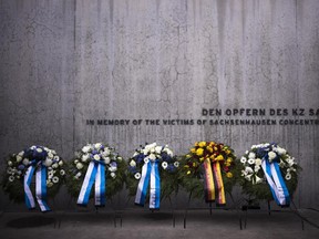 Wreaths at the memorial wall of Nazi concentration camp