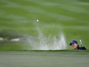 Lauren Kim plays a shot from a bunker on the 16th hole during the first round of the Women's PGA Championship golf tournament at Atlanta Athletic Club in Johns Creek, Ga., Thursday, June 24, 2021. Kim of Surrey, B.C., headlines Golf Canada's two squads for the upcoming World Amateur Team Championships.