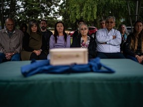 Family members of Mary Sara gather with local community members for the burial of her brain at Evergreen Washelli, a cemetery in Seattle, on Aug. 29. MUST CREDIT: Washington Post photo by Salwan Georges.
