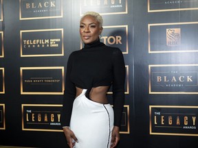 Jully Black poses for a photograph on the black carpet for The Legacy Awards in Toronto on Sunday, September 24, 2023.