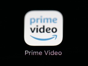 FILE - Amazon's Prime Video streaming app on an iPad is seen in Baltimore on March 19, 2018. Amazon says that it will now start charging $2.99 per month in order for users in the U.S. to watch Prime Video ad free.