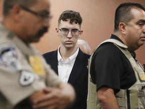 FILE - El Paso Walmart shooting suspect Patrick Crusius pleads not guilty during his arraignment, Oct. 10, 2019, in El Paso, Texas. On Monday, Sept. 25, 2023, Crusius, the white gunman who killed 23 people in a racist attack on Hispanic shoppers at a Texas Walmart in 2019, agreed to pay more than $5 million to families of the victims.