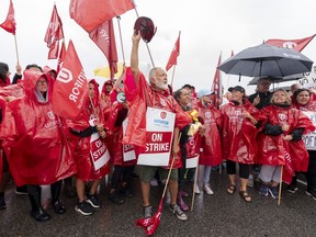 A new survey from the Angus Reid Institute found that for more than half of Canadians, the right to strike outweighs the risk of economic consequences. Striking employees of the grocery store Metro are seen on a picket line in Toronto, on Wednesday, Aug. 23, 2023.