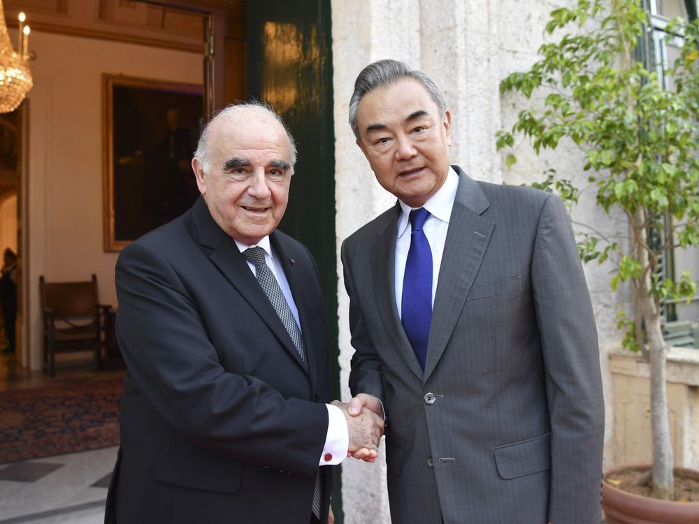 In this photo released by Xinhua News Agency, Chinese Foreign Minister Wang Yi, right, is greeted by Maltese President George Vella at the presidential palace in Valletta, Malta on Sunday, Sept. 17, 2023. China's top foreign policy official is heading to Russia for security talks after two days of meetings with U.S. President Joe Biden's national security advisor over the weekend in Malta.
