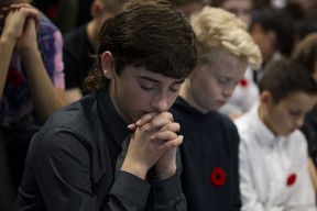 Prayers at a Remembrance Day ceremony.