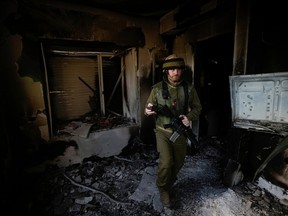 An IDF soldier in Kibbutz Be'eri