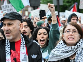 People take part in a pro-Palestinian rally in Montreal on Oct. 13, 2023, following the slaying of 1,400 Israeli men, women and children by the Hamas terrorist group in an attack on Oct. 7.