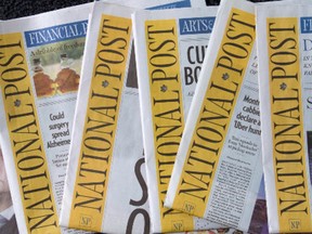A stack of National Post newspapers.