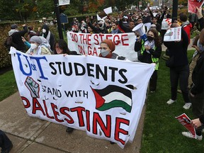 University students take part in a pro-Palestinian rally outside the provincial legislature in Toronto on Oct. 20, 2023.