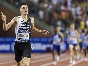 FILE - Jakob Ingebrigtsen from Norway crosses the finish line to win the 2000m men event and set a new world record time during the Diamond League Memorial Van Damme athletics event at the King Baudouin stadium, Brussels, on Sept. 8, 2023. Norwegian police launched an investigation Thursday, Oct. 26, 2023, into allegations by the three Ingebrigtsen brothers that their father, who had been their track coach at the Olympics and other events, was violent and abusive when they were growing up.