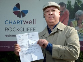 Chris Monk displays a recent bill from Chartwell Rockcliffe Retirement Residence.