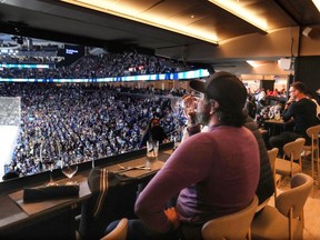 Customers in the newly redesigned Mastercard Executive Suite at the Scotiabank Arena watch an NHL pre-season game in Toronto, Thursday, Oct. 5, 2023. The Scotiabank Arena "Reimagination" project consists of a $350 million multi-phase renovation to areas including concourses, suites, premium clubs and retail spaces.