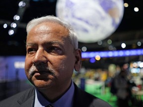 FILE - Saleemul Huq, a pioneering climate scientist from Bangladesh, poses for a photo during the COP26 U.N. Climate Summit in Glasgow, Scotland, Nov. 8, 2021. Huq, who pushed to get the world to understand, pay for and adapt to worsening warming impacts on poorer nations, died of cardiac arrest Saturday, Oct. 28, 2023. He was 71.