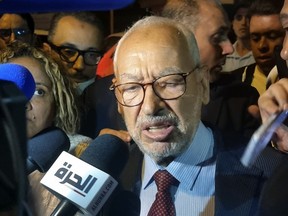 FILE - Leader of the Ennahdha party, Rached Ghannouchi, speaks to the media after he was freed by the Tunisia's anti-terrorism unit in Tunis, Tunisia, Tuesday, July 19, 2022. The leader of Tunisia's moderate Islamist party has been sentenced to 15 months in prison for supporting terrorism and inciting hatred in the North African country. The Court of Appeal in the capital, Tunis, pronounced the sentence against the Ennahdha leader Rached Ghannouchi late Monday.
