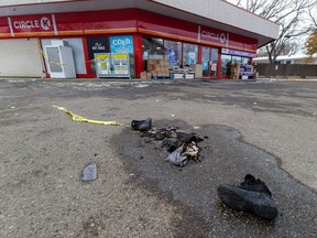 Edmonton fire crews responded to a convenience store and gas station at 109 Street and 61 Avenue Oct. 28, 2023, after reports a woman's clothes had ignited. Burnt clothing and shoes could be seen after the woman was taken to hospital. Greg Southam-Postmedia