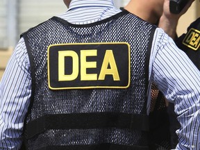 FILE - This June 13, 2016, file photo shows Drug Enforcement Administration agents in Florida. Jorge Hernández is expected to play a key role in the October 2023 Manhattan federal trial of two veteran DEA agents charged in a $73,000 bribery conspiracy involving leaked information about ongoing drug investigations.