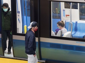 Montreal's public transit authority is poised to equip its security officers with cayenne pepper aerosol gel, pending approval from its board at a meeting this evening. People wear face masks as they commute via metro in Montreal, Saturday, Oct. 17, 2020.