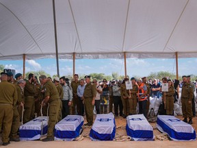 Coffins at a funeral in Israel