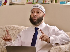 Adnan Syed answers a question following a press conference at his family's home, Sept. 19, 2023, in Windsor Mill, Md. Arguments are set to begin Thursday, Oct. 5, 2023, in Maryland's Supreme Court over Syed's appeal of a reinstatement of his murder conviction by the state's intermediate appellate court.