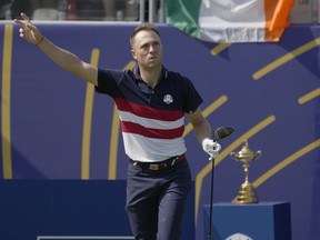 FILE - Justin Thomas reacts on the first tee as his ball goes right off the tee during his singles match at the Ryder Cup golf tournament at the Marco Simone Golf Club in Guidonia Montecelio, Italy, Sunday, Oct. 1, 2023. Thomas will be playing for Atlanta Drive GC in the new primetime television TGL League that starts in January.