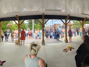 A drum circle in memory of Sharif Rahman at the farmers market in downtown Owen Sound, Ont., on Aug. 25, 2023.