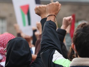 Pro-Palestinian supporters demonstrate outside Ontario's provincial legislature on Oct. 24, 2023.
