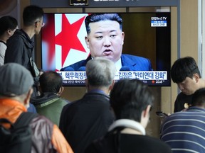 A TV screen shows an image of North Korean leader Kim Jong Un during a news program at the Seoul Railway Station in Seoul, South Korea, Thursday, Sept. 28, 2023. Kim called for an exponential increase in production of nuclear weapons and for his country to play a larger role in a coalition of nations confronting the United States in a "new Cold War," state media said Thursday.