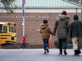 FILE - Students return to Richneck Elementary School in Newport News, Va., Jan. 30, 2023. Lawyers in Newport News will argue, Friday, Oct. 27, 2023, over whether a teacher at Richneck who was shot by her 6-year-old student should receive only workers' compensation for her injuries.