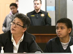 FILE - Chrystul Kizer, right, and her attorney Larisa Benitez-Morgan sit together in the Kenosha County Courthouse in Kenosha, Wis., Feb. 6, 2020. Using the video and transcript of Kizer's 2018 interview with Kenosha police investigators as trial evidence would likely violate the Milwaukee woman's constitutional rights, Kenosha Circuit Court Judge David Wilk ruled on Tuesday, Oct. 31, 2023.
