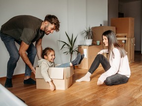 young family new home moving in