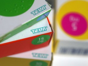 Boxes of tablets produced by Teva Pharmaceutical Industries Ltd. sit on a pharmacy counter.