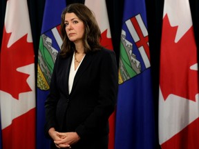 Premier Danielle Smith takes part in a press conference where she outlined the Alberta Sovereignty Within A United Canada Act motion that she will bring before the Alberta Legislature, in Edmonton Monday Nov. 27, 2023.