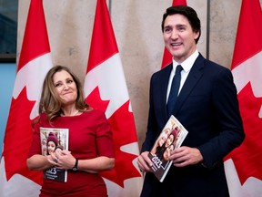 Deputy Prime Minister and Minister of Finance Chrystia Freeland, left, and Prime Minister Justin Trudeau take part in a photo opportunity during the Fall Economic Statement on Parliament Hill in Ottawa, on Tuesday, Nov. 21, 2023.