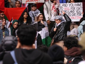 People attend a pro-Palestinian rally in Toronto.