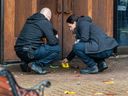 Police investigate a firebombing at the Congregation Beth Tikvah synagogue in Montreal on Nov. 7, 2023, the same night a nearby Jewish community centre was firebombed.