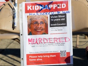 A hostage poster of Vivian Silver with the word "murdered" written on it.