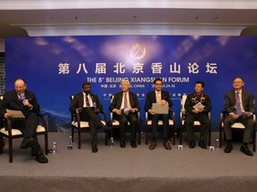 Michael Kovrig at a panel in China