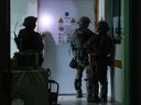 Israeli soldiers carry out operations inside Al-Shifa hospital in Gaza City, amid continuing battles betweeen Israel and Hamas.
