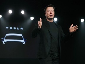 FILE- Tesla CEO Elon Musk speaks before unveiling the Model Y at Tesla's design studio March 14, 2019, in Hawthorne, Calif. A Florida judge ruled Friday, Nov. 17, 2023, that a jury should decide whether Tesla and Elon Musk oversold the electric car company's Autopilot system that caused the fatal crash of a software engineer who engaged it and took his hands off the steering wheel. A trial is scheduled for 2024.