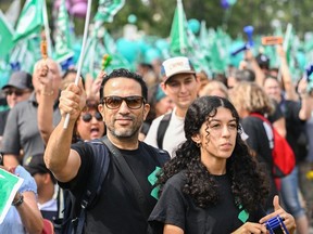 People take part in a public sector union demonstration in Montreal, Saturday, September 23, 2023.