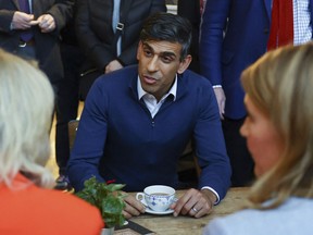 British Prime Minister Rishi Sunak meets with small business owners from Sunny Bank Mills, at The Emma White Jewellery Studio in Sunny Bank Mills, Farsley, Britain, Thursday Nov. 23, 2023.