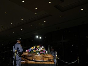 A Georgia State Patrol honor guard stands as members of the public pay respects to former first lady Rosalynn Carter at the Jimmy Carter Presidential Library and Museum in Atlanta, Monday, Nov. 27, 2023, during the public repose.